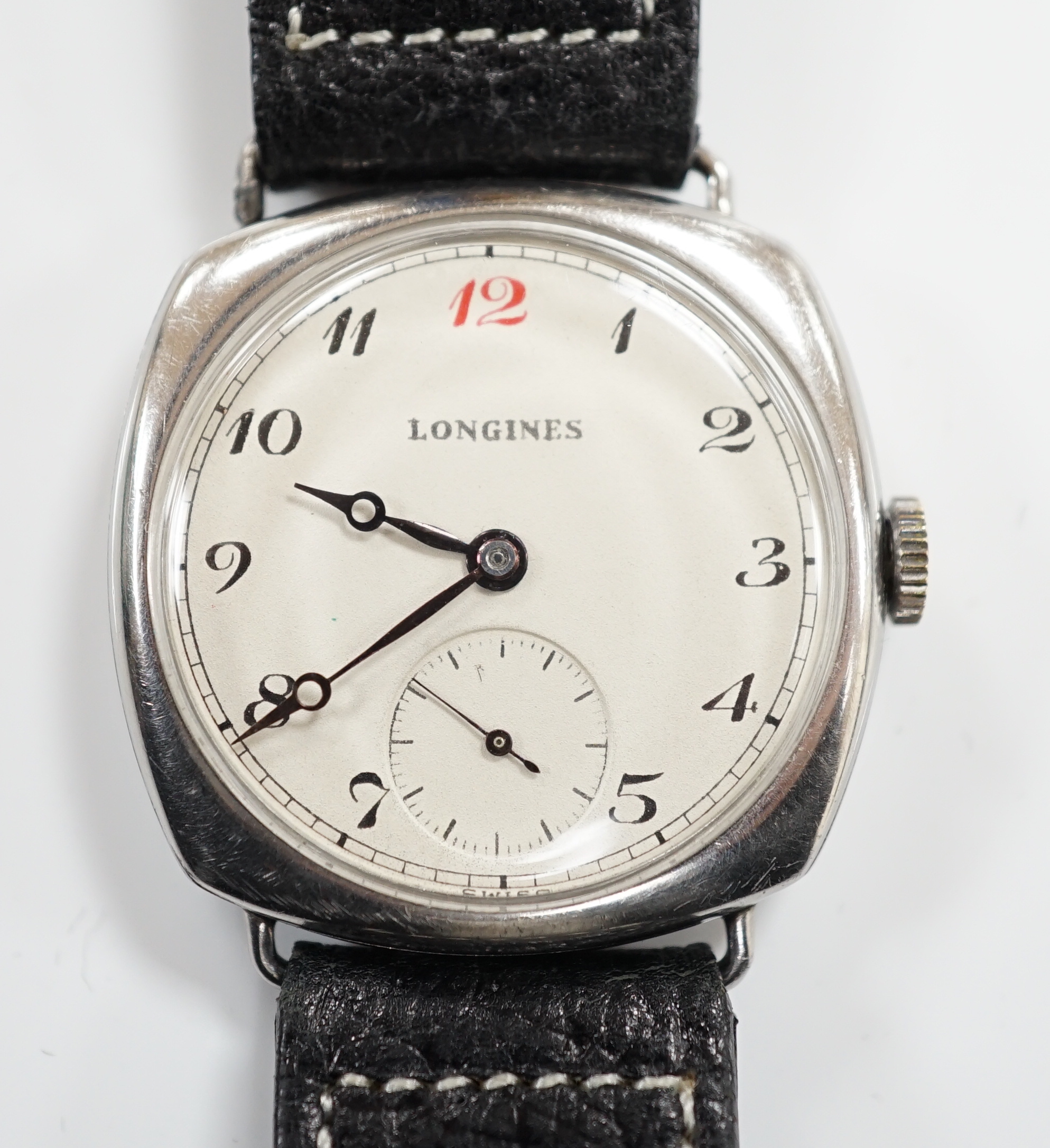 A gentleman's 1930's? stainless steel Longines manual wind wrist watch, with Arabic dial and subsidiary seconds, case diameter 32mm, on an associated leather strap.